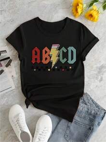 Camiseta Gráfica Retro de los Años 80 para Mujeres de Talla Grande - Camiseta Negra de Cuello Redondo y Manga Corta con Estampado de Letras Multicolor, Ligera y Transpirable para Fiestas Temáticas de los Años 80 y Uso Casual, Estampado Vibrante de Letras ABCD, Corte Relajado, Lavable a Máquina, Tallas S-3XL, 100%. - Negro - Ver 6