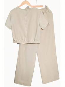SDHT Women's Solid Color Minimalist Round Neck Short Sleeve Top And High Waist  Pants 2-Piece Set, Spring/Summer,  Women's New Solid Color Minimalist Round Neck Short Sleeve Top And High Waist Wide Leg Pants 2-Piece Set, Spring/Summer, Loose Fit Summer Outfit For Daily Wear& Office Casual, Beige Summer Set/2pc Charm Women Spring Summer Outfit, Active Outfit/2pc, Curve Gift For Women. - Màu be - Xem 11