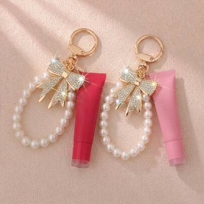 15ml tragbare befüllbare Blumen-Lipgloss-Röhrchen mit Perlen- und Strass-Schleifen-Schlüsselanhänger - modische Quetsch-Leerröhrchen für das Auftragen und Verteilen von Lipgloss, Reiseessentiell