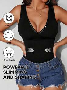 Camiseta sin costuras con cuello en V de unicolor y elegante para mujer, casual en color negro - Negro - Ver 1