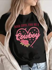 1 camiseta de manga corta Olist. Querido Cupido, por favor, busca un diseño de San Valentín con un patrón de corazón de vaquero para mí. Es casual, ligera y cómoda, adecuada para fiestas y uso diario. 180g 100% Algodón. - Negro - Ver 1