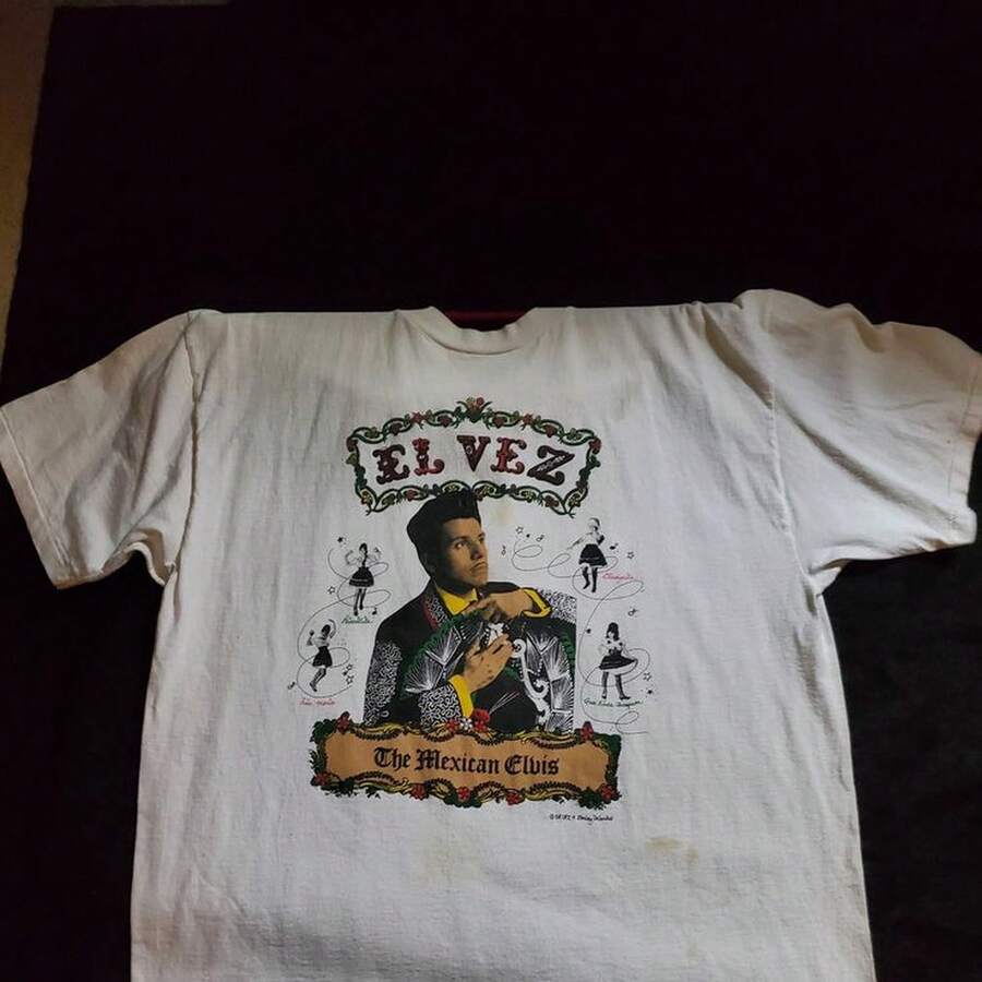 Camiseta Elvez220G C1AmiS1eta de AL1Godn esencial uniS1ex, 220 g de suavidad úniC1A. PensA1DA1 Para A1DAptarse a todaS1 Las perS1onas, hombres y mujeres por igual. Tela duradera de gran C1Alidad, listA1 Para cualquier corte, D1ELIC1A1DA al tacto pero construidA1 Para resistir. TopS1 Ligeros mujer, conjuntos otoñales, ropa de vaC1Aciones, disfraces de new years para ella. - Blanco - Ver 1