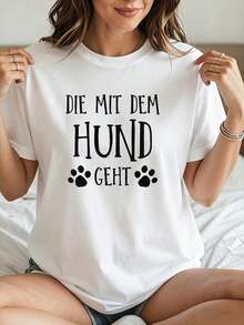 Camiseta de mujer con estampado en alemán "DIE MIT DEM H GEHT" y un estampado de un perro caminando, cuello redondo, decoración de huellas de pata, mangas cortas casuales, estilo sencillo e informal, camisetas para mujeres amantes de los perros que las usan para pasear a sus perros a diario. - Blanco - Ver 1