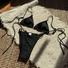 Nuevo bikini de dos piezas sexy con accesorio de flor de perlas y diseño creativo en color sólido. - Negro - Ver 9