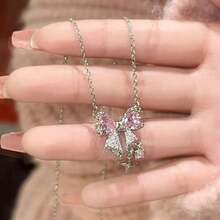 Bộ trang sức 3 món đính đá Zirconia hồng lấp lánh hình nơ tình yêu, mặt dây chuyền và bông tai, thiết kế thanh lịch tối giản, thích hợp cho ngày Valentine. - Đồ trang sức - Xem 4