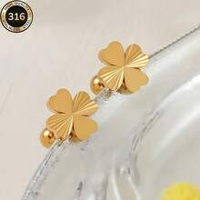 Bộ 2 bông tai hình trái tim đính cỏ bốn lá mạ vàng 18K bằng thép không gỉ - Kiểu dáng thời trang và thanh lịch - Thích hợp cho phụ nữ đeo hàng ngày, dự tiệc, đám cưới, ngày lễ và làm quà tặng. - 1 Cặp - Xem 2