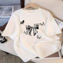 Camiseta de Manga Corta Blanca para Mujer Verano 2025 con Estampado de Lazo Lindo, Top Holgado - Blanco - Ver 2