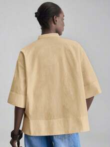 de diseño versátil y casual de serie esencial con sensación de lujo minimalista, con cuello redondo, hombros caídos y diseño suelto, silueta corta por delante y larga por detrás, de estilo urbano moderno y elegante para oficina, ideal para bod - Caqui - Ver 3