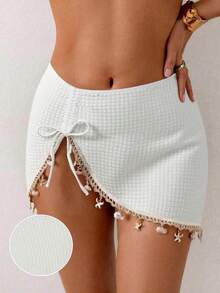 Falda de punto negra para cubrir el bikini con decoración de conchas y estrellas de mar, con abertura sexy. - Blanco - Ver 9