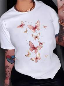 Pink Butterflies Symbolizing Freedom, Transformation, And Inner Beauty, Surrounded By Golden Sparkles, Conveying Serenity And Hope In Every Detail. A Modern, Comfortable, Casual Women's T-Shirt For Everyday Wear. - 白色 - 查看 1