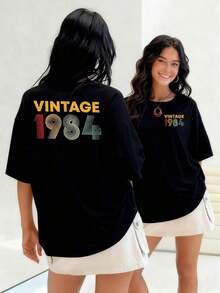 Vintage Graphics With The Numbers 1984 Evoke Nostalgia And A Retro Spirit, Ideal For Lovers Of Classic Style. This Women's T-Shirt Is Made Of 100% High-Quality Cotton And Is Suitable For Spring, Summer, And Autumn. - 黑色 - 查看 7