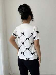 Camiseta casual versátil de rayas con gráficos para mujeres - Blanco y Negro 2 - Ver 2
