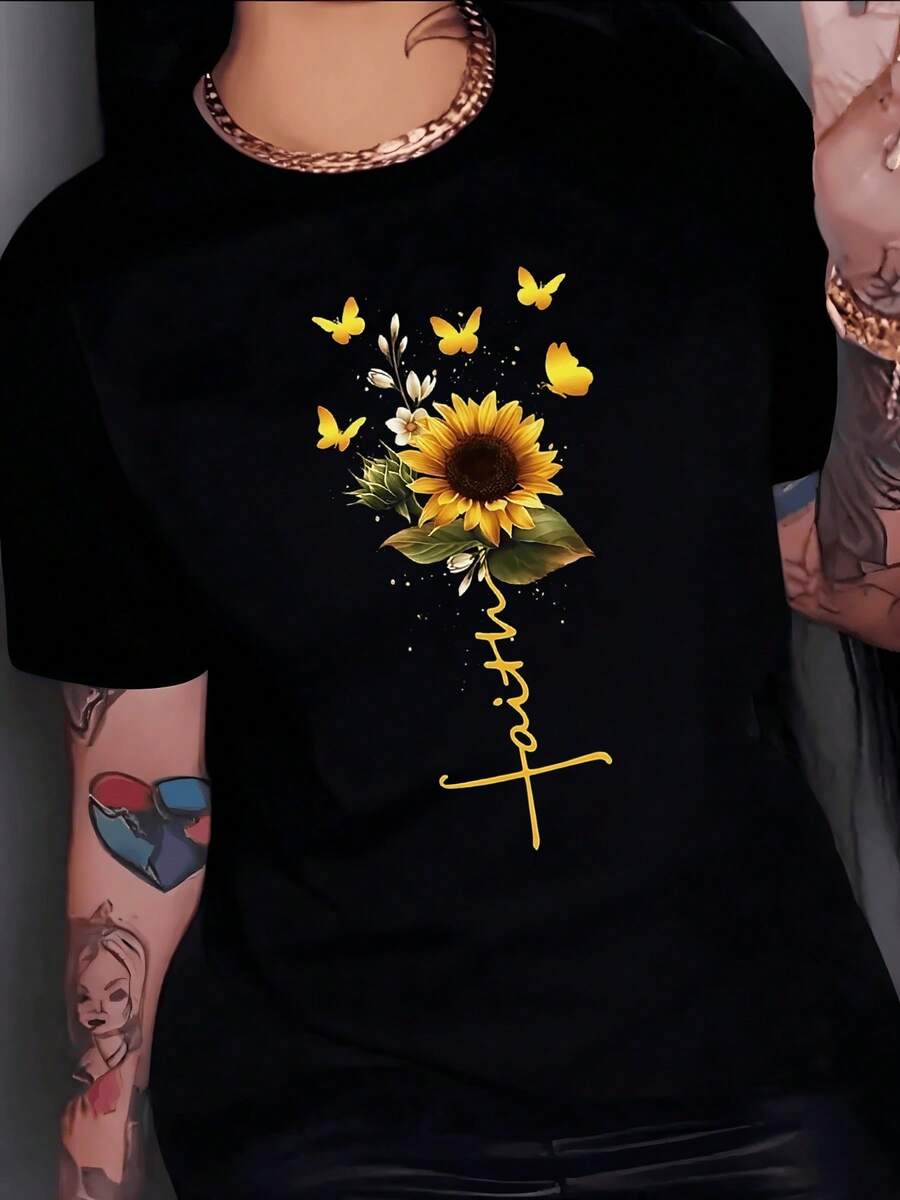 Golden Butterflies Flying Around A Bright Sunflower Symbolizing Hope And Faith, Accompanied By Green Leaves And Warm Light. Women's Casual, Modern, Comfortable T-Shirt For Everyday Wear. - 黑色 - 查看 1