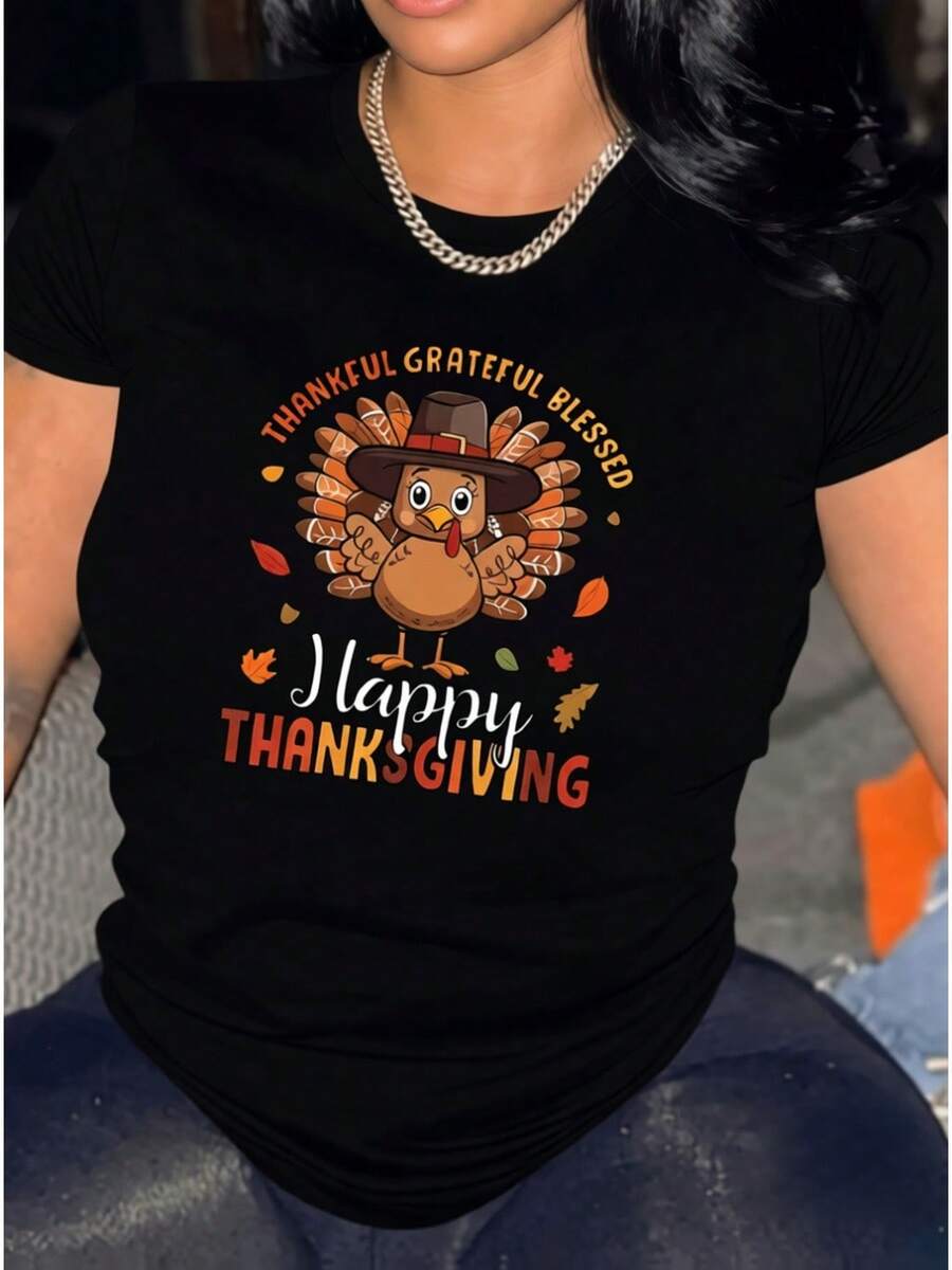 Camiseta deportiva casual para mujer con diseño de pavo de acción de gracias en estilo cartoon - Camiseta negra elástica de cuello redondo, lavable aáquina, de ajuste cómodo para todas las estaciones. Prenda de ocio con temática festiva y tejido opaco. - Negro - Ver 1