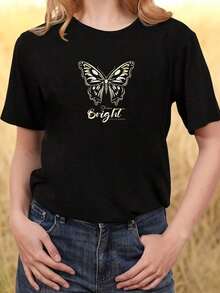 Camiseta de manga corta para mujer con cuello de mariposa y bloques de color - Top casual de cuello redondo, blusa transpirable y lavable a máquina para uso diario y ocasiones semi-formales - Camiseta cómoda para mujer - Negro - Ver 1