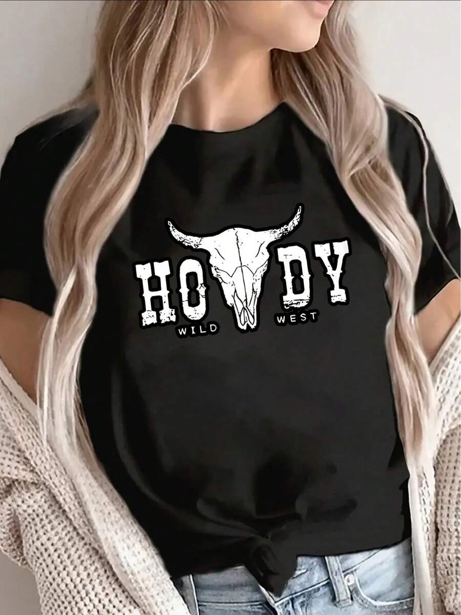 Camiseta negra de manga corta, ligera y duradera, con un diseño de cabeza de toro blanca y la inscripción "HOWDY" en estilo vaquero, es perfecta para salidas informales en casa o en restaurantes, ofreciendo una experiencia de uso diario cómoda. - Negro - Ver 1