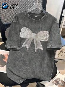 1 camiseta vintage con estampado de lazo de lentejuelas y efecto desgastado, de una marca americana de moda, de algodón lavado con cuello redondo y manga corta, personalizada, adecuada para vacaciones, salidas, uso casual, deportes, regalos y otras ocasiones. 100% algodón, 180g. - Negro - Ver 7