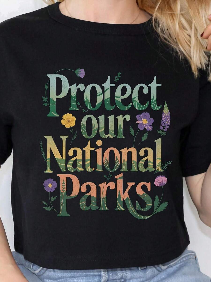 Camiseta "Protejamos nuestros parques nacionales", camiseta "E1cof1riendly T1EE", regalo para amantes de la naturaleza, ropa para entusiastas de la naturaleza, camiseta conservacionista, camiseta teñida en prenda. Camiseta unisex de algodón puro de 220 g, peso ideal para todas las estaciones, apta tanto para hombres como para mujeres. Tejido duradero de alta calidad, suave al tacto y de larga duración. Prenda transpirable, adecuada para el uso de otoño y vacaciones de las mujeres. - Negro - Ver 1