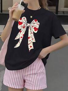 CasualPlayera Roja para Mujer con Gráfico de Moño Gigante Estampado de Corazones, Camiseta Manga Corta Cuello Redondo Estilo Coquette y Romántico para San Valentín Moda CasualMust-have - Negro - Ver 7