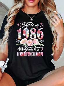 Women's T-Shirt "Created In 1986: Celebrating 40 Years Of Excellence" For A 40th Birthday Theme, With Floral Slogans, Casual Short Sleeves And A Fresh Pink And White Design, Perfect For Commemorating 40 Years Since 1986 - 黑色 - 查看 1