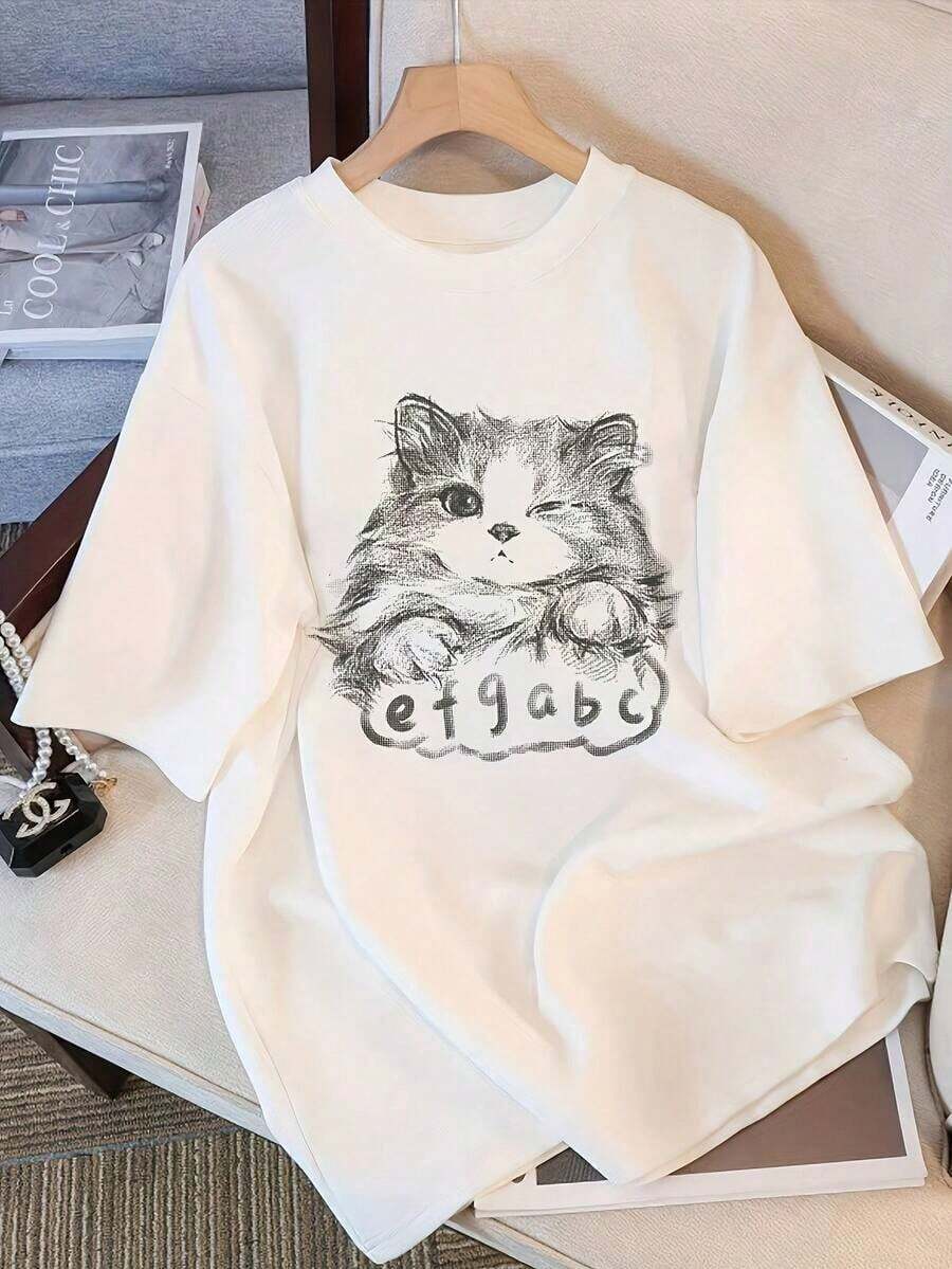 Camiseta de corte estándar para mujer| Camiseta con estampado de gato lindo y fondo de color sólido| Perfecto para descansar, actividades informales o deportivas.| Lavable a máquina| Tela de elasticidad media para todas las estaciones, cuello redondo, transpirable y cómoda. - Blanco - Ver 1