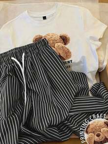 Conjunto de camiseta de manga corta con cuello redondo y estampado de oso de dibujos animados, y pantalones a rayas con cordón en la cintura para mujer - Blanco 3 - Ver 9