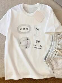 Camiseta de Cuello Redondo Oversize para Mujer Estilo Y2K - 100% Algodón, Camiseta Casual de Verano con Lazo de Dibujos Animados y Gráfico Soy la Más Linda, Manga Corta y Ajuste Holgado, Tejido Suave - Blanco - Ver 1