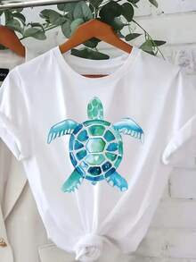 Camiseta de Mujer Suave y Transpirable con Estampado de Tortuga - una Blusa Blanca de Playa de Manga Corta y Cuello Redondo, con un Diseño de Océano Azul-Verde, Adecuada para Uso Casual y Viajes.Esta camisa lavable a máquina ofrece comodidad durante todas las estaciones. - Blanco - Ver 5