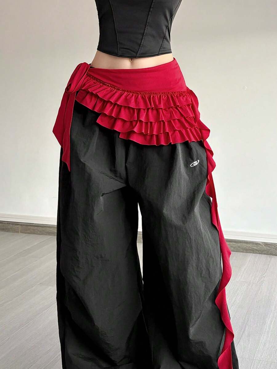 YeonC 女士不对称荷叶边迷你裙，飘逸的系带设计，非常适合舞台和演唱会服装 - 紅色 - 查看 1