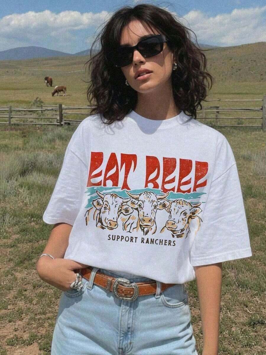 Camiseta 'Eat Beef' Estilo Retro Western de los 90s, Camiseta Vintage con Gráficos de Ganado y Vacas, Camiseta de Apoyo a los Ganadores, Camiseta con Gráficos de Ganado, Camiseta 'Gracias a un Agricultor', Ropa de Vaquero, Camiseta de Granja. | Mujeres Verano Imprimir Redondo Cuello Corto Manga Informal Camiseta Gráfico Camisetas Mujeres Tops2026nuevo Estilo Vacaciones Conjuntos de ropa Mujeres Verano Ropa Concierto Conjunto de ropa Mujeres País Concierto Conjunto-Vintage Calle Estilo Unisexo Suelto Algodón Corto Manga Tripulación Cuello Camiseta 100% algodón puro - Blanco - Ver 1