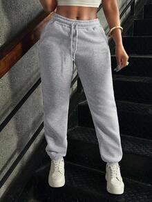Pantalones deportivos jogger de mujer con unicolor, cintura con cordón y bolsillos - Gris Claro - Ver 6