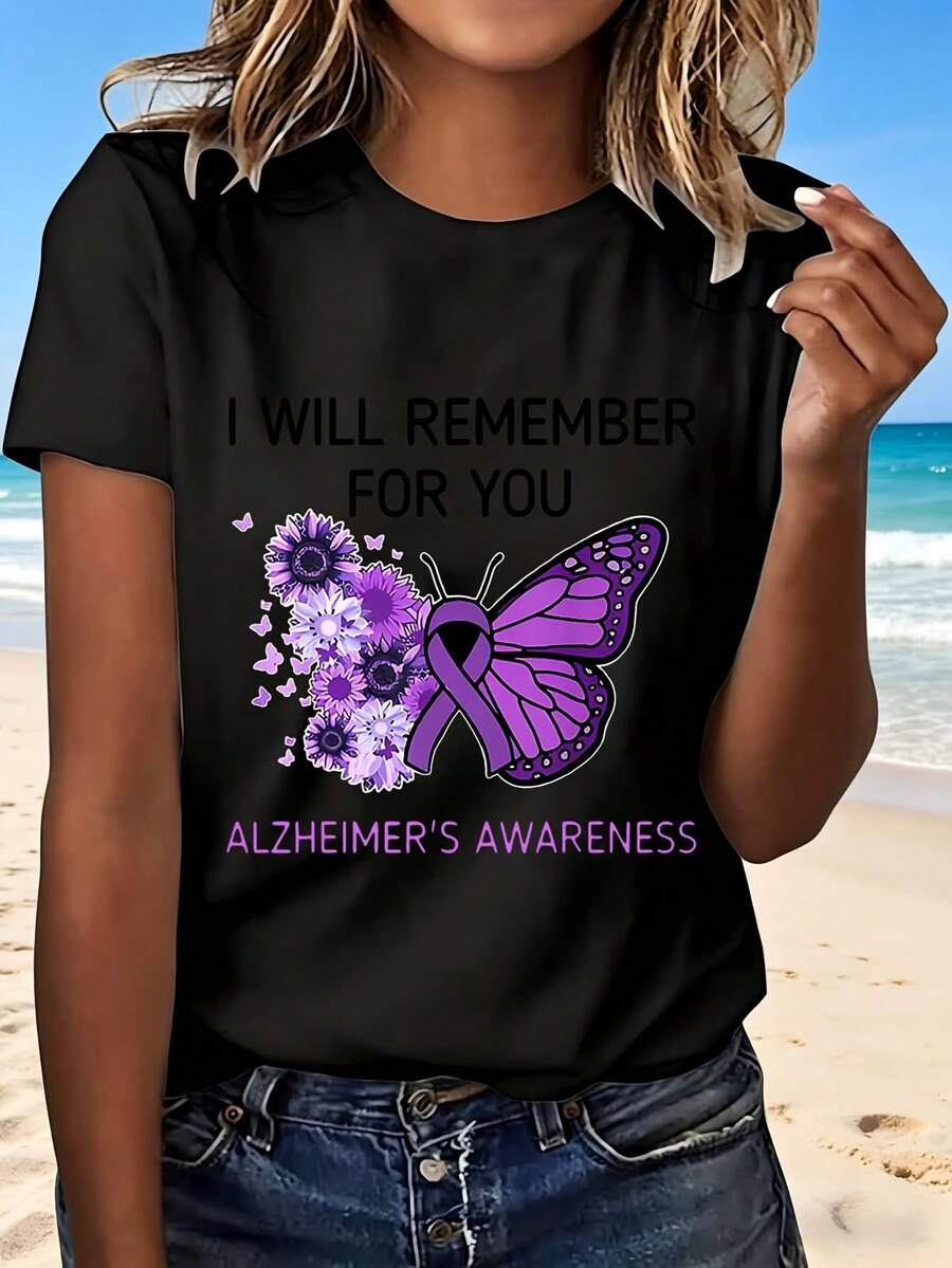 Camiseta negra informal para mujer con estampado gráfico de mariposa morada, cinta y flor para concienciar sobre el Alzheimer, manga corta, cuello redondo, corte regular, poliéster. - Negro - Ver 1