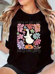 Suave, transpirable y ligera para comodidad durante todo el día. Camiseta de uso diario para mujer con cuello redondo y estampado floral de pato con la frase "Lo siento, llego tarde, estaba - Negro - Ver 7