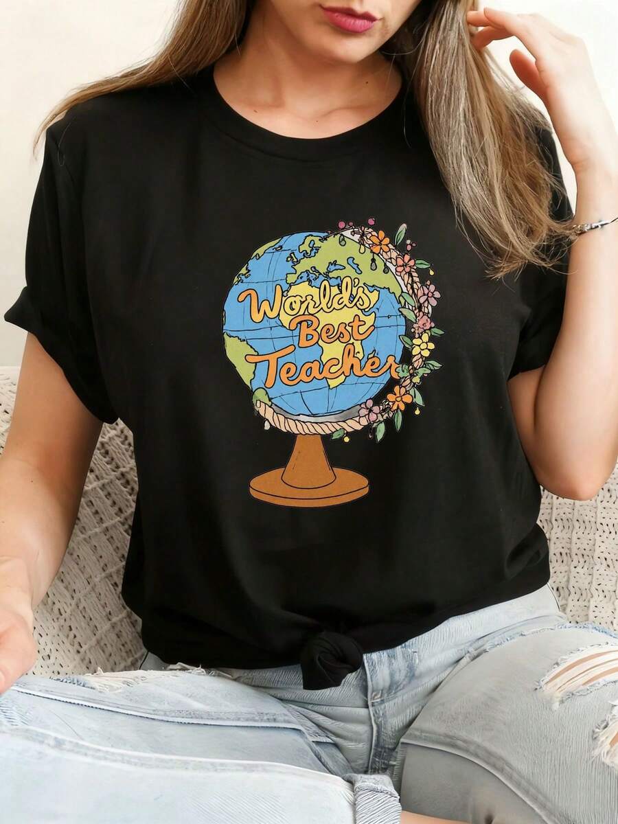 Camiseta Negra con Estampado de la Tierra El Mejor Maestro del Mundo - Camiseta Casual de Cuello Redondo con Patrones Florales Coloridos y Plantas Verdes, combinada con jeans rasgados azul claro, un regalo perfecto para la Semana de Agradecimiento a los Maestros, la Temporada de Regreso a Clases o cualquier ocasión especial - Camiseta Unisex de Algodón, Manga Corta, Cuello Redondo, Estilo Vintage Urbano. - Negro - Ver 1