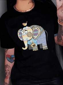Elefante decorado con patrones étnicos multicolor y un pequeño pájaro sobre su cabeza que simboliza la armonía y la inteligencia de la naturaleza camiseta de mujer casual moderna cómoda para uso diario - Negro - Ver 1
