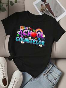 Camiseta de manga corta con cuello redondo para mujer, con estampado de manzanas coloridas, crayones de arcoíris y flores, ideal para el trabajo y uso casual en verano. - Negro - Ver 2