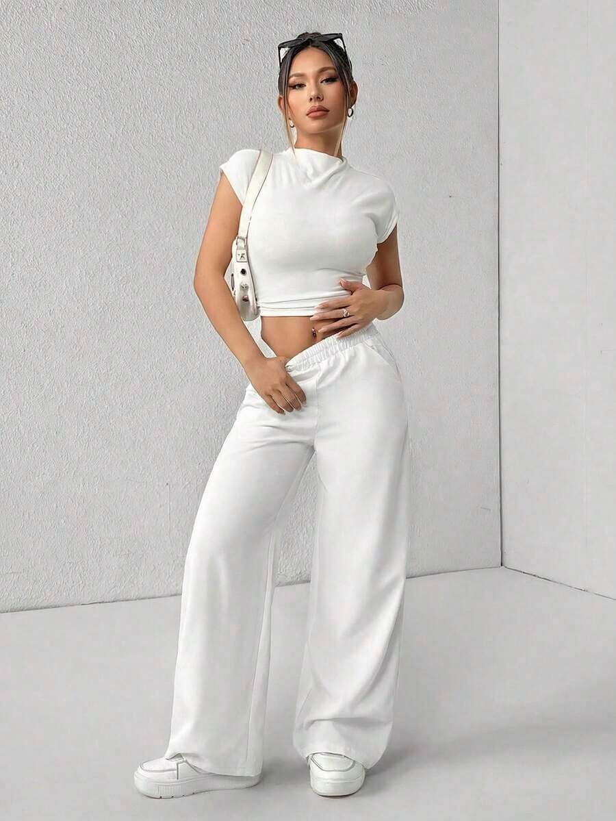 Pantalones de pierna de campana con cintura alta, elásticos y acanalados para mujeres - Blanco - Ver 1