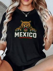 Jaguar feroz rugiendo con garras extendidas símbolo de fuerza mexicana sobre fondo oscuro representando energía salvaje y orgullo nacional camiseta de mujer casual moderna cómoda para uso diario - Negro - Ver 6