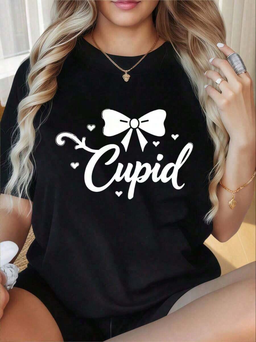 Loose1 pieza Camiseta de San Valentín con corazón y lazo de Cupido para mujeres, negra, linda, romántica, gráfica, para el amor, moda de vacaciones, impresión divertida del Día de San Valentín, camisetas de mujer con cuello redondo y mangas cortas, adecuadas para fiestas de Navidad, actividades deportivas, fiestas de vacaciones, salidas, deportes y otros regalos de vacaciones. Camiseta básica de algodón 100% suave con cuello redondo para mujer - Negro - Ver 1