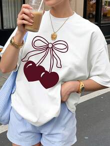 Camiseta estampada de alta gama para mujer, estilo moderno de primavera-verano, cuello redondo, estampado de corazón de dibujos animados, cereza y lazo, camiseta casual de manga corta, elegante y fresca para el verano. - Blanco - Ver 7