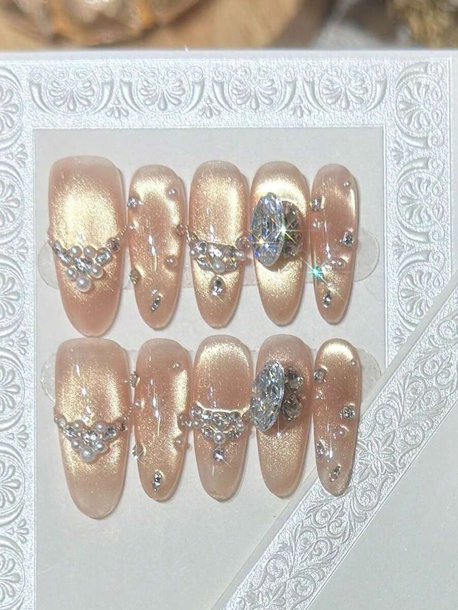10 móng tay giả đính ngọc trai và pha lê lấp lánh, kiểu mắt mèo màu vàng nude với điểm nhấn lấp lánh, móng giả dài hình bầu dục/nhọn, lý tưởng cho đám cưới và lễ tốt nghiệp, kèm keo dán và dũa móng, dụng cụ làm móng DIY. - Màu Hồng baby - Xem 1