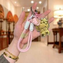 SANRIO 三丽鸥可爱造型吊坠，可收纳硬币和耳机。独特可爱，适合作为汽车装饰、手提包挂饰、背包吊坠、斜挎包配件、钥匙扣，也是个性化礼物、生日礼物、返校礼物、旅行纪念品、派对礼物、情侣礼物、婚礼礼物等。 - 彩色 - 查看 11