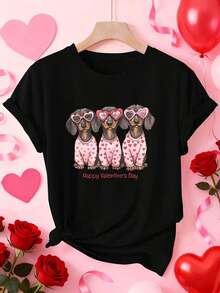 Nuevas llegadas para el verano. Camiseta de manga corta para mujer con estampado de mascota "Feliz Día de San Valentín" para el Día de San Valentín, elegante y a la moda, estilo casual deportivo para primavera, verano y otoño, suave y cómoda, con cuello redondo. Disponible en camiseta, blusa, camisa > Hermosa. - Negro - Ver 1