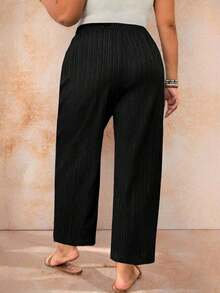 Pantalones de talla grande en color liso y con textura casual - Negro - Ver 4