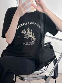 Y2K Style, Modern Style, Newest Of 2026, Cute Style, Casual Style. Y2K Style, Modern Style, Newest Of 2026, Cute Style, Casual Style. Short-Sleeve T-Shirt With Floral Print "SPARKS OF LIGHT 2003 IN THE SUNLIGHT", Leisure Time, Graphic T-Shirts 180g (S-XXXL) 180g (S-XXXL) - 黑色 - 查看 4