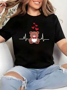 Camiseta de Mujer con Oso de Peluche Marrón, Lazo Rojo, Línea de Latidos del Corazón Blanca y Corazones Rojos en la Parte Superior, Diseño de Dibujos Animados para Camiseta Gráfica - Negro - Ver 1