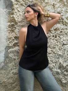 Blusa negra ajustada de estilo casual y elegante para la temporada de primavera/verano, con cuello asimétrico, sin mangas, escote halter, espalda descubierta y decoración de lazo - Negro - Ver 6