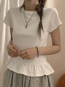 Camiseta de manga larga de corte holgado con volantes en el bajo, a rayas blancas y negras, diseño minimalista de verano para mujer - Blanco - Ver 4