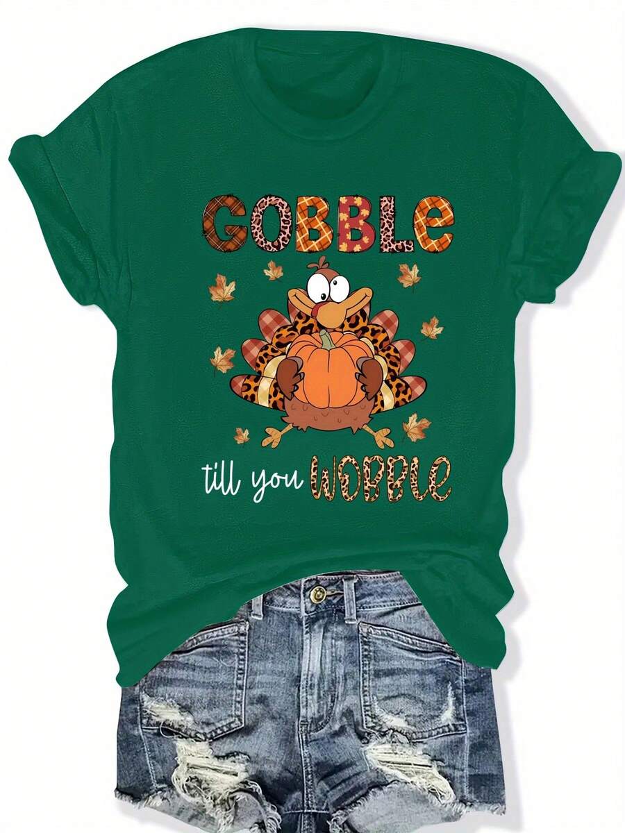 Camiseta Gráfica Rosa de Talla Grande para Mujer con la Frase "Gobble Till You Wobble" - Cuello Redondo Casual, Manga Corta, Diseño Temático de Otoño y Halloween con Calabaza y Hojas de Otoño, Ropa Casual|Estampado Divertido|Tela Elástica - Verde - Ver 1