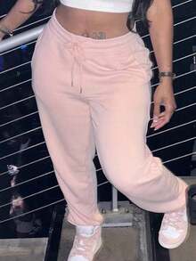 Pantalones deportivos jogger de mujer con unicolor, cintura con cordón y bolsillos - Rosa Pálido - Ver 1